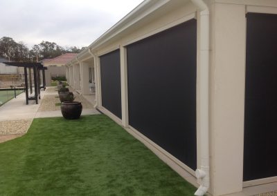 Add extra style to your home with black outdoor roller blinds